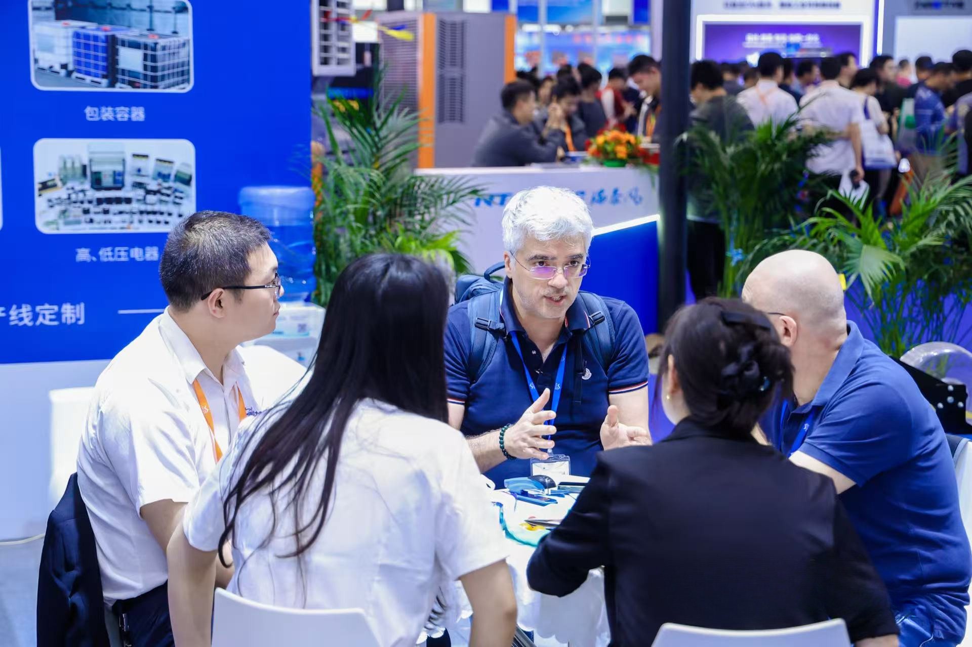 International buyers exploring advanced manufacturing technology at ITES exhibition